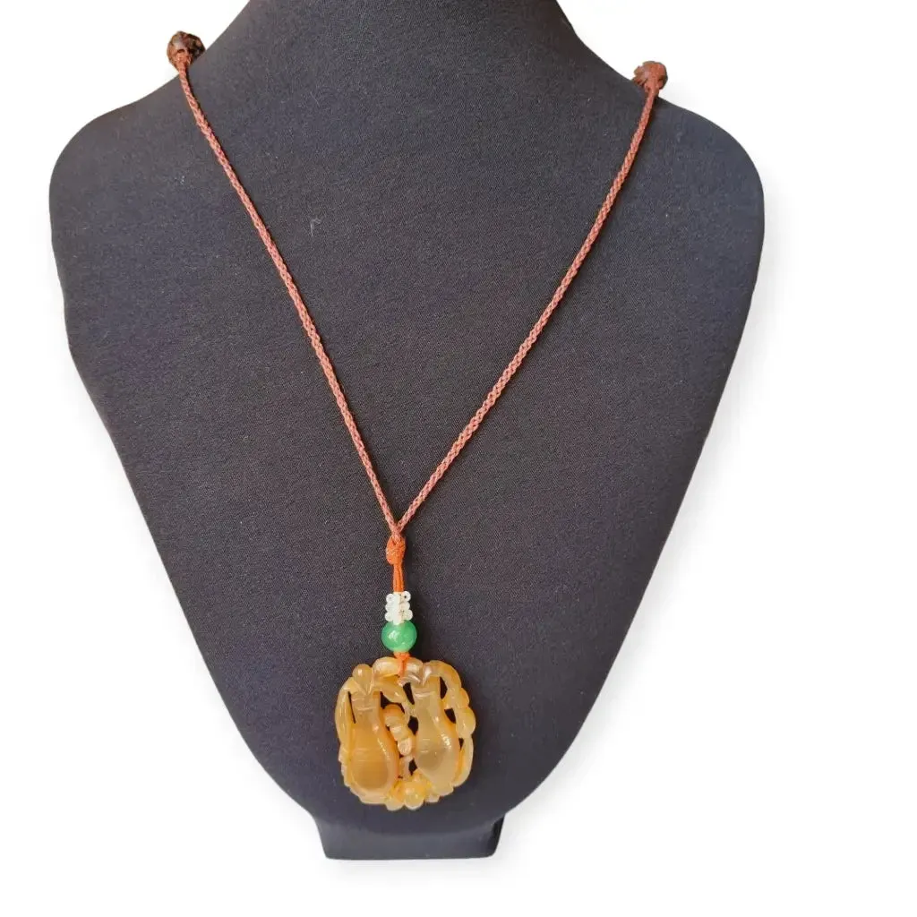 Chinese orange jadeite jade necklace with two vases, carved on both sides.
