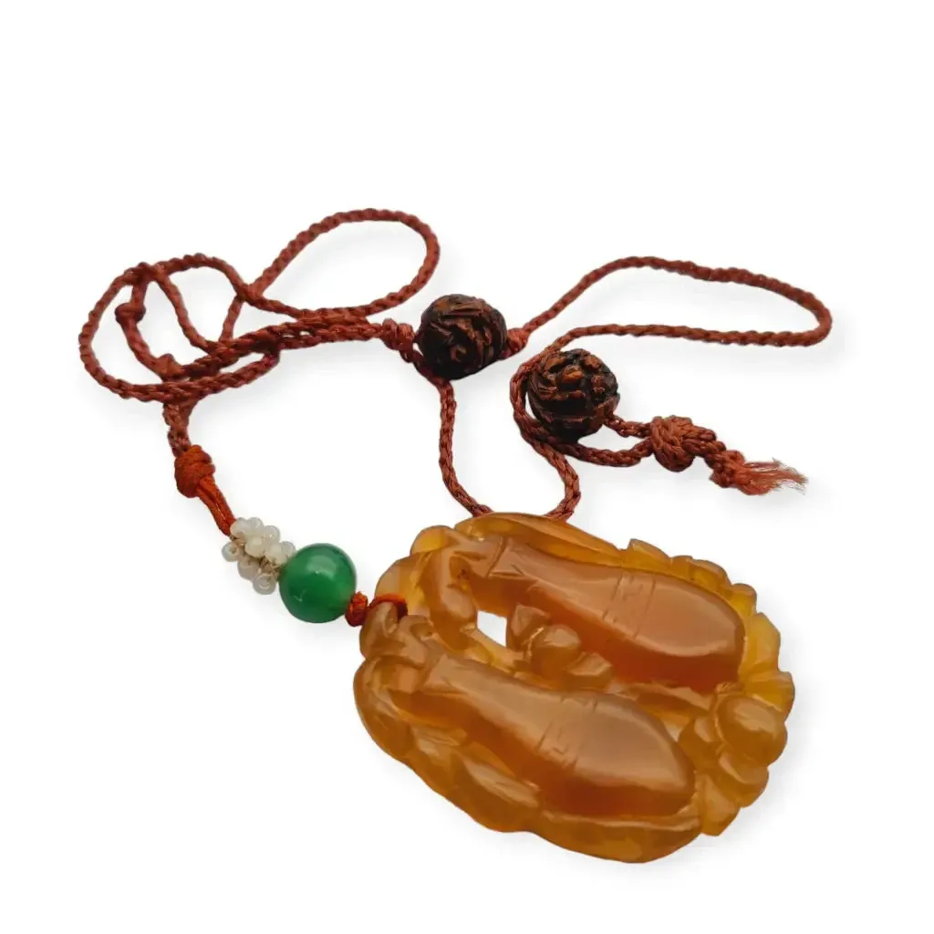 Chinese orange jadeite jade necklace with two vases, carved on both sides.