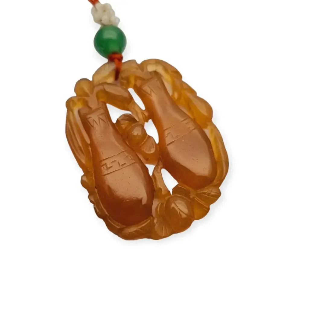 Chinese orange jadeite jade necklace with two vases, carved on both sides.