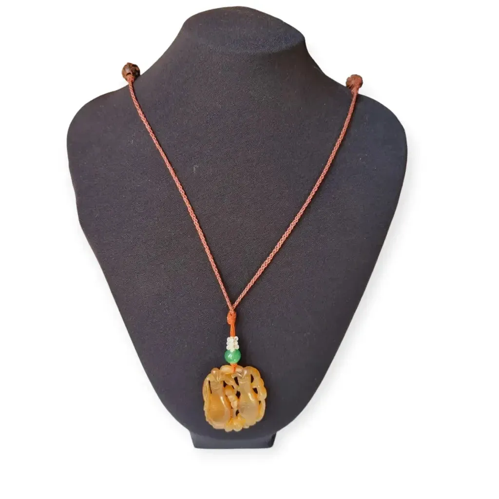 Chinese orange jadeite jade necklace with two vases, carved on both sides.