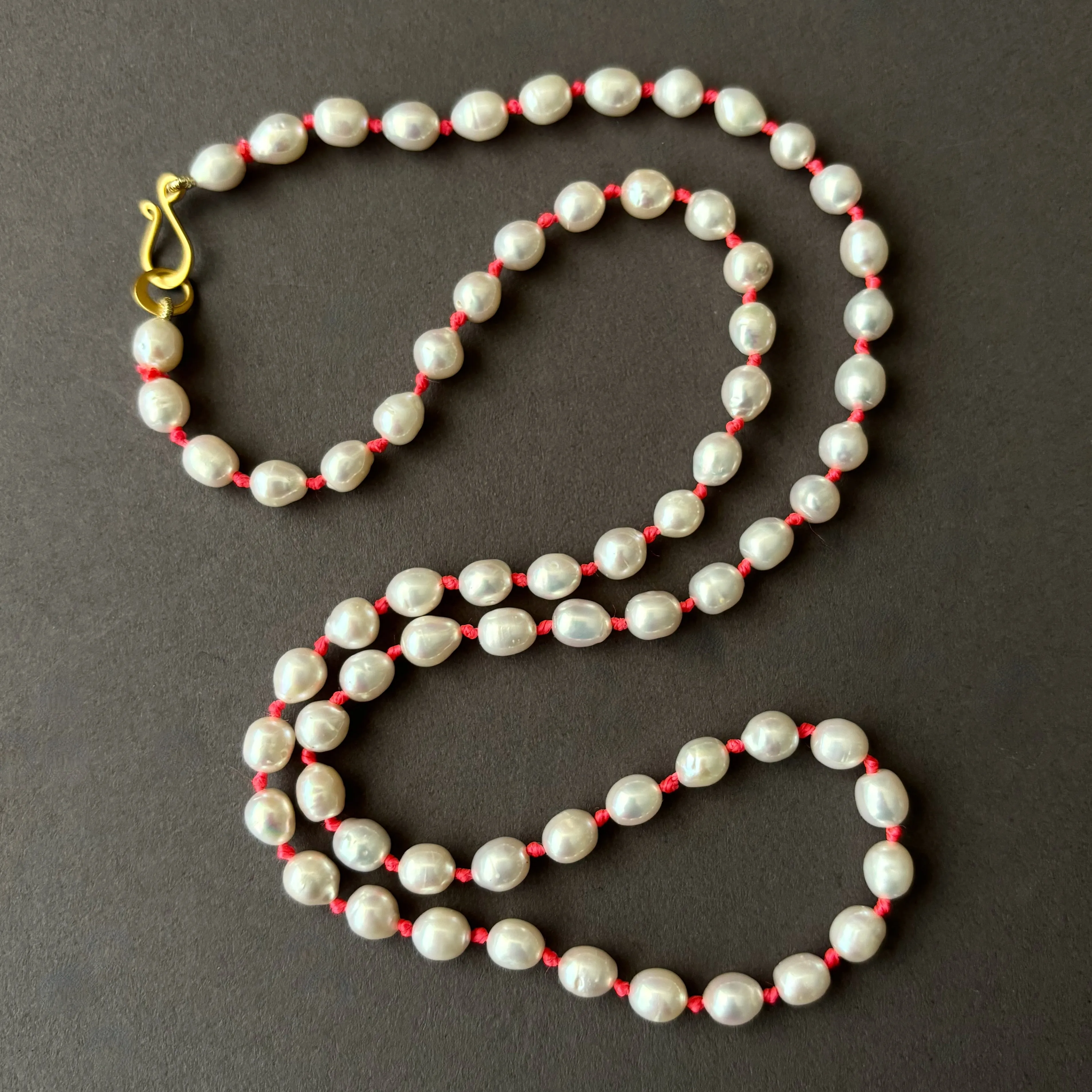 white fresh water pearls on neon knots